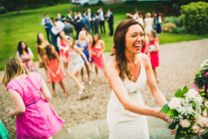 bride about to toss bouquet
