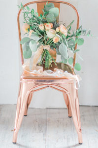 Peach and copper wedding inspiration rental company chairs